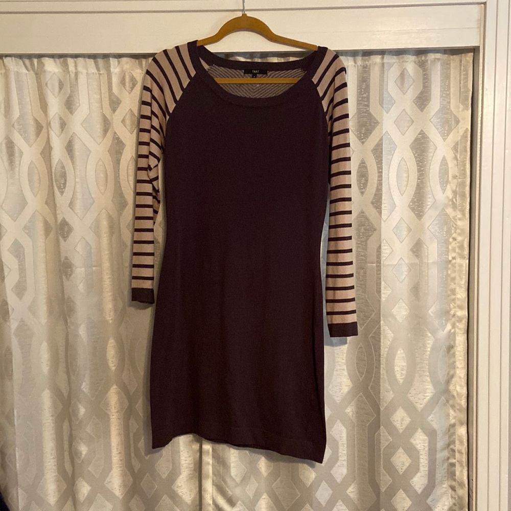 Gray and cream fitted sweater dress.